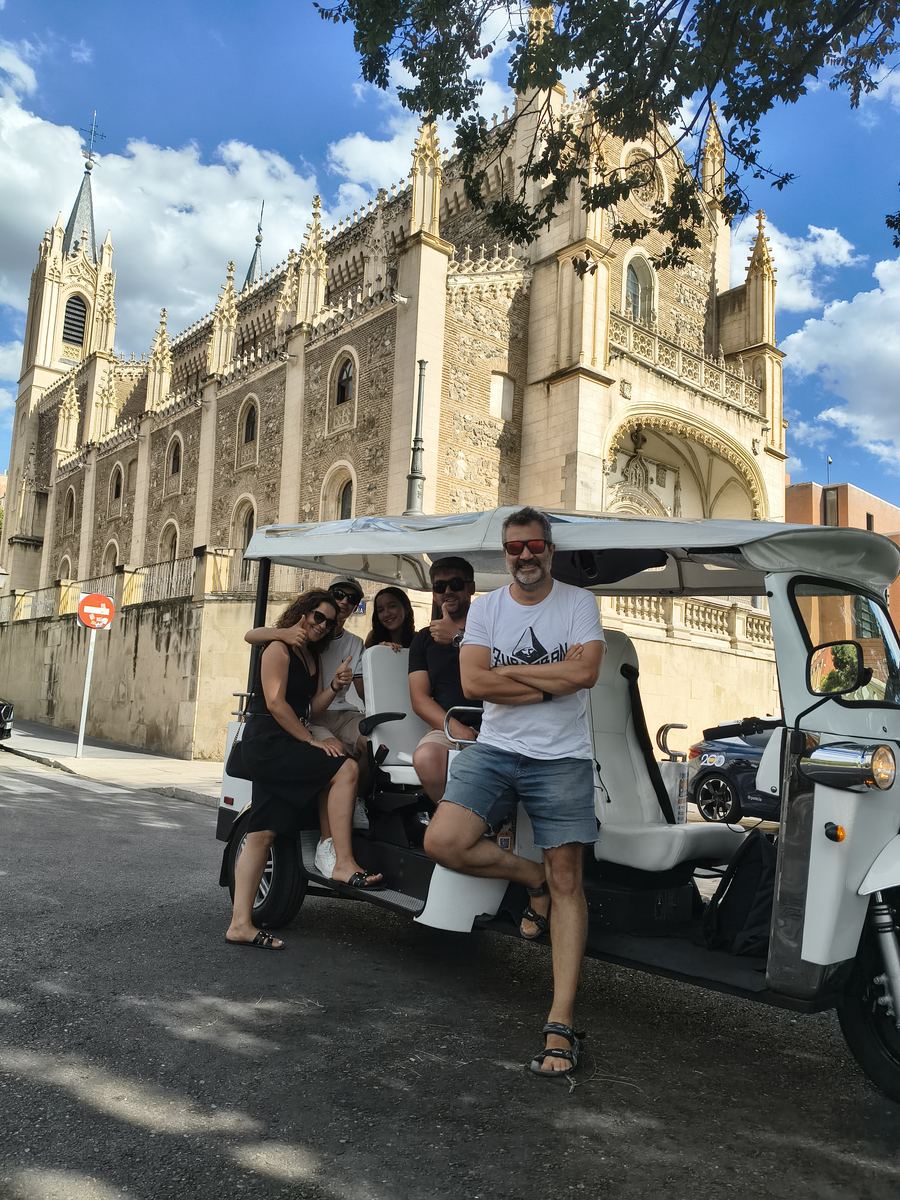 Tuk Tuk tour group in front of San Jerónimo el Real church, Madrid